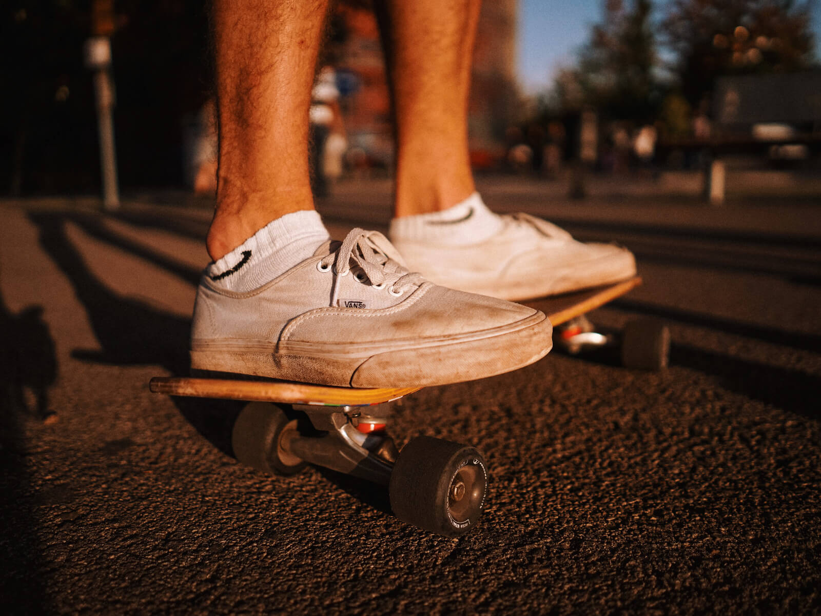 close up image of shoes on a skateboard
